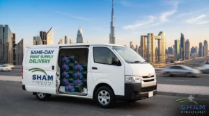 Sham Tech same-day print supply delivery van in Dubai with the Burj Khalifa skyline in the background